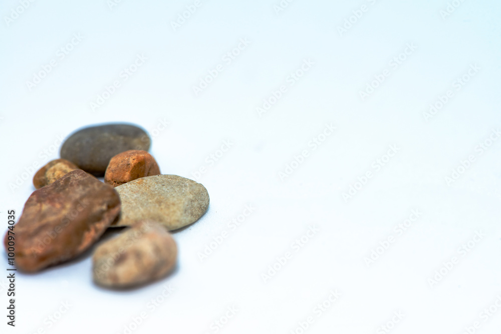 Macro Photo of Pebble Stones on White Background Macro Photo of Pebble Stones on White Background