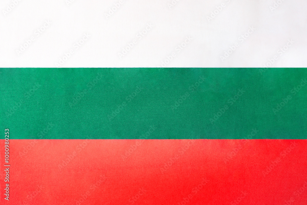 the national flag of Bulgaria on a fabric basis in close-up the national flag of Bulgaria on a fabric basis in close-up