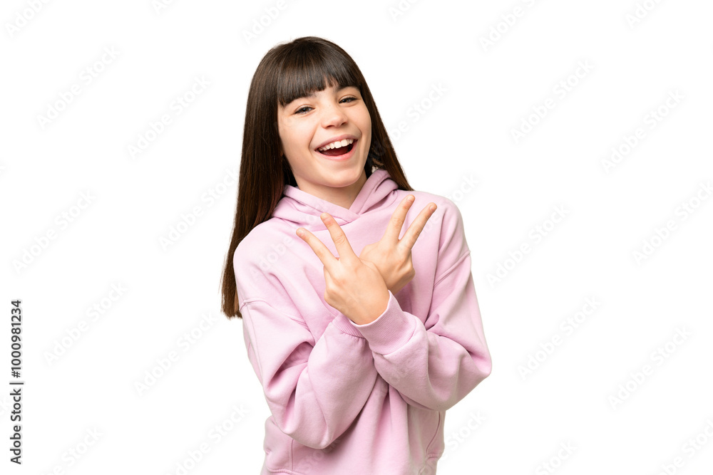 Little girl over isolated green chroma key background smiling and showing victory sign Little girl over isolated green chroma key background smiling and showing victory sign