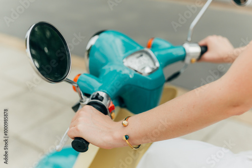 Retro-Style Turquoise and Beige Scooter – Vintage Vibes Photo