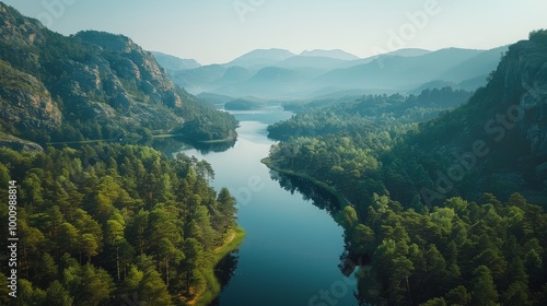 Mountain lake with forest reflection and scenic peaks 