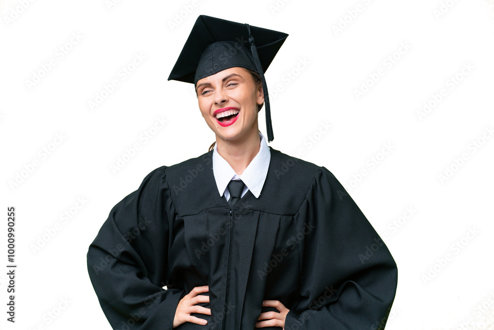 Young university graduate caucasian woman over isolated background posing with arms at hip and smiling Young university graduate caucasian woman over isolated background posing with arms at hip and smiling