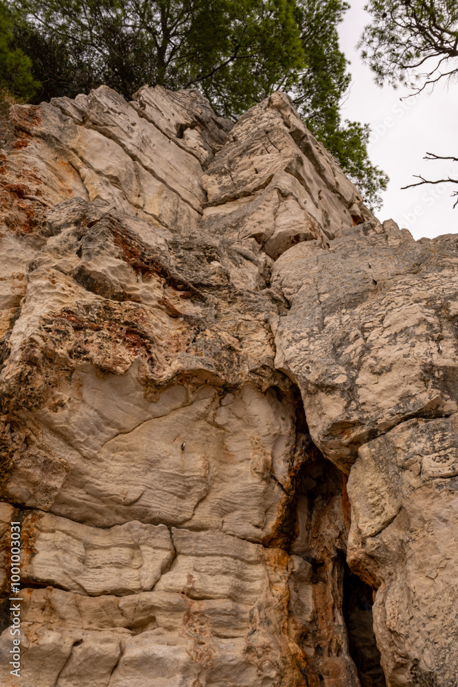 Rock climbing - rocks equipped with bolts (sport climbing routes) in the forest park Golden Cape Zlatni rt, Rovinj (Rovigno) - Istria, Croatia Rock climbing - rocks equipped with bolts (sport climbing routes) in the forest park Golden Cape Zlatni rt, Rovinj (Rovigno) - Istria, Croatia