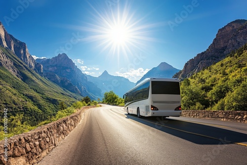 A tour bus driving through a scenic mountain road with lush greenery and towering peaks all around.