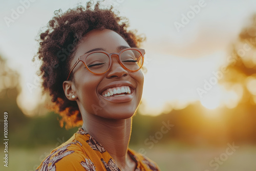 Joyful Woman in Sunrise Glow  photo