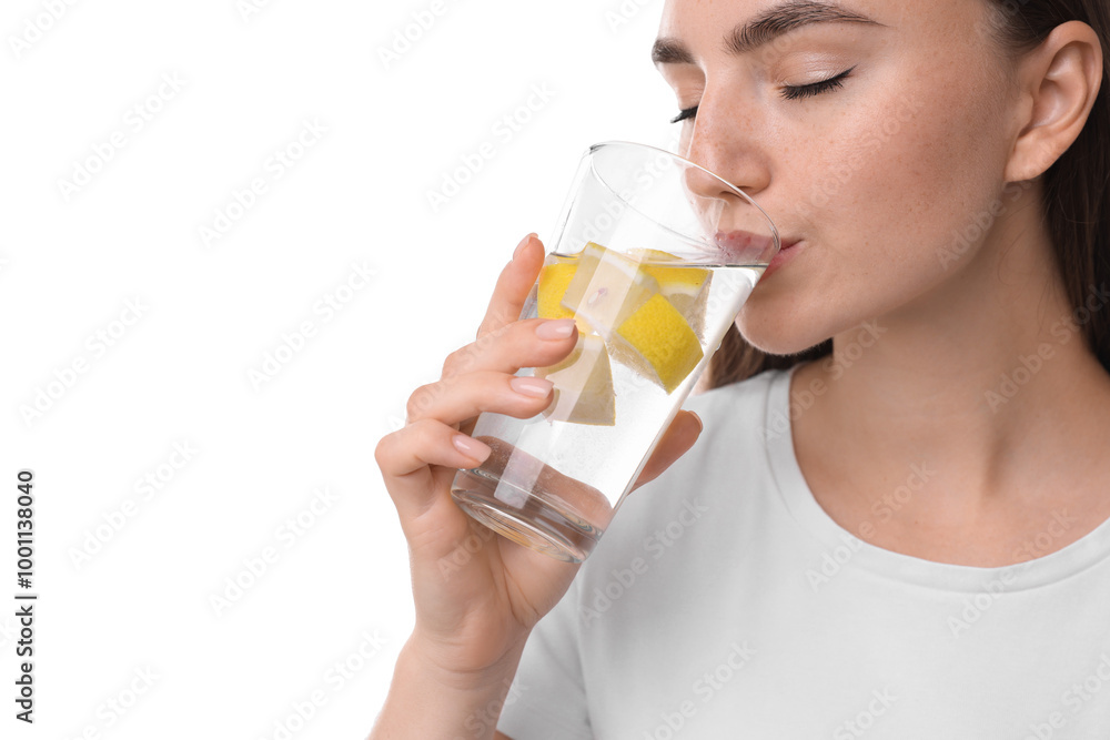 Woman drinking water with lemon on white background, closeup Woman drinking water with lemon on white background, closeup