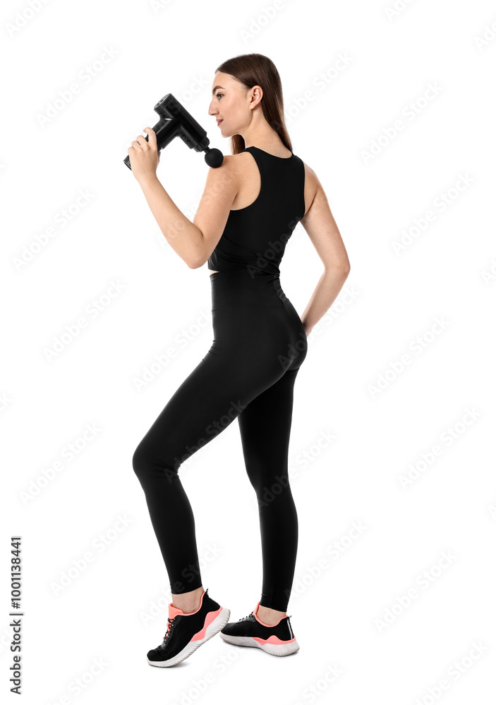 Young woman massaging her shoulder with percussion massager on white background Young woman massaging her shoulder with percussion massager on white background