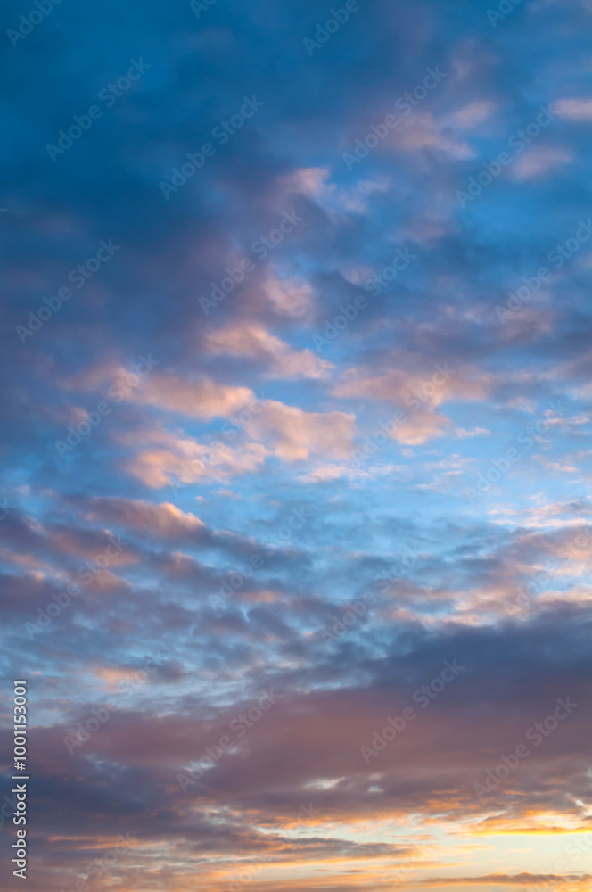 Sunset sky background, beautiful sunset sky view. Vast panoramic sunset sky with dramatic colorful clouds Sunset sky background, beautiful sunset sky view. Vast panoramic sunset sky with dramatic colorful clouds