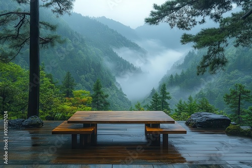 misty morning in the mountains reveals a tranquil wooden table adorned with natural elements harmonizing with the scenic landscape outside photo