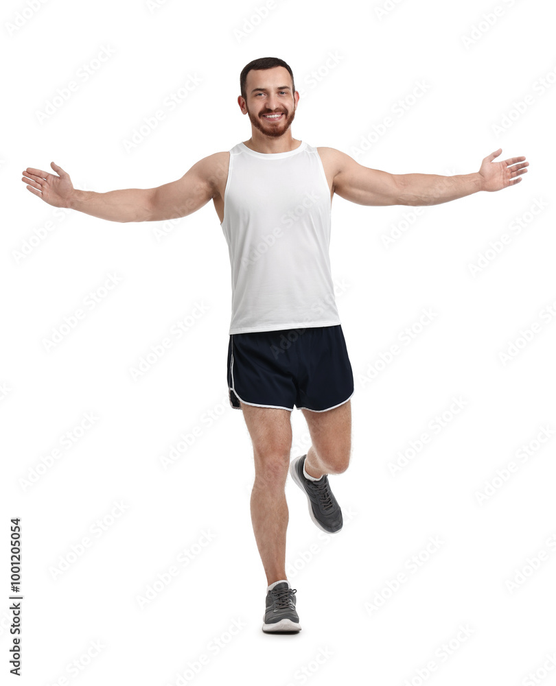 Handsome young man running on white background Handsome young man running on white background