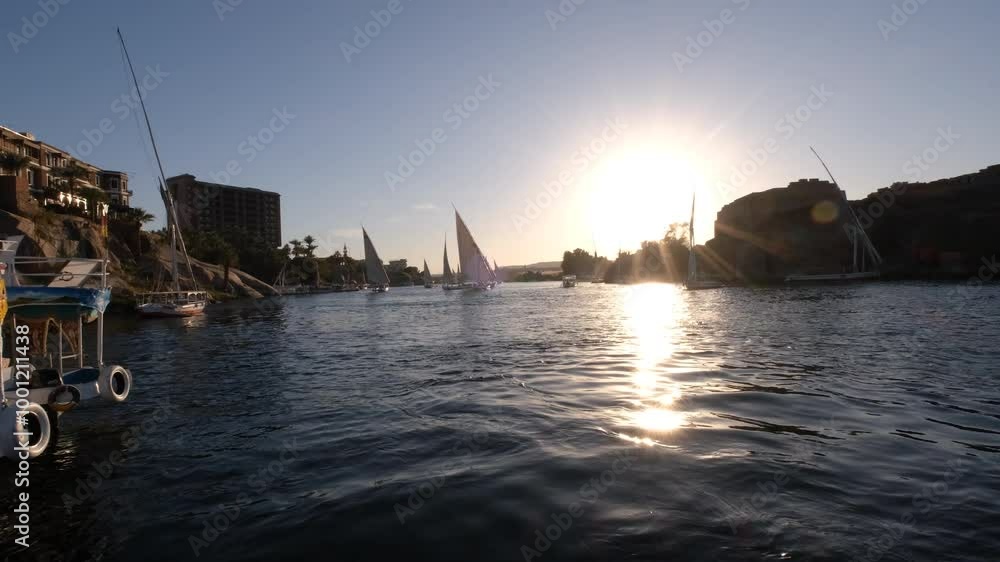 09/02/2024 ,Aswan Egypt, Tourist boats float on the Nile River, at Aswan Egypt 09/02/2024 ,Aswan Egypt, Tourist boats float on the Nile River, at Aswan Egypt