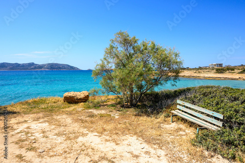 A bench overlooking the Aegean Sea on the island of Ano Koufonisi. Small Cyclades, Greece photo