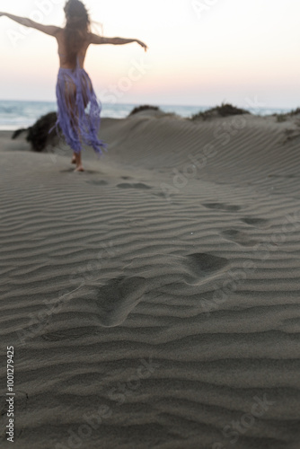 Happy traveler with arms up enjoying freedom outside - Wanderlust, wellbeing, happiness and travel concept