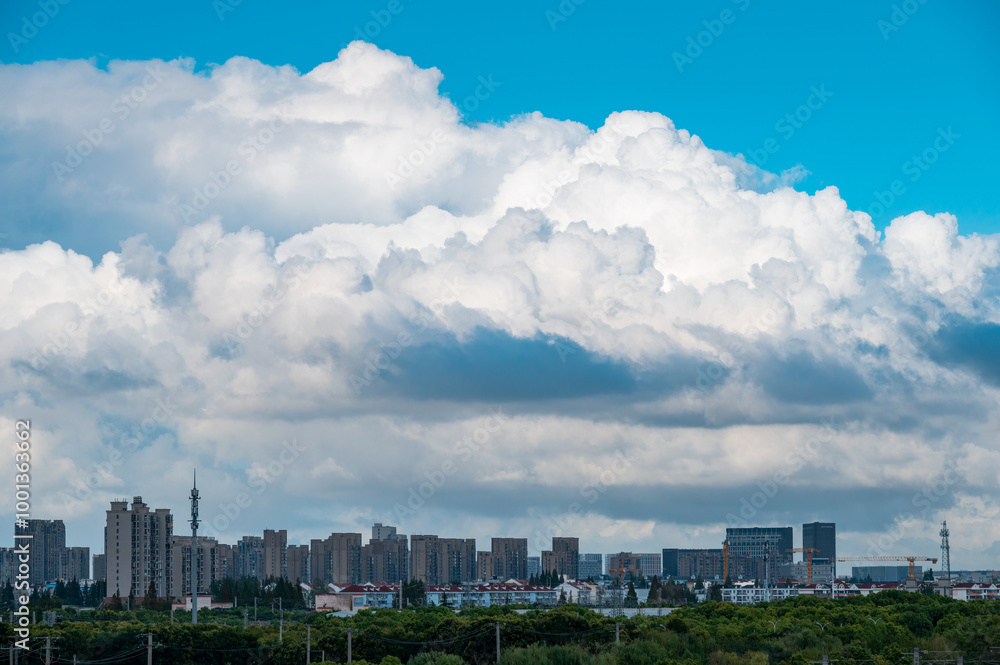 Cumulus clouds over the city in summer Cumulus clouds over the city in summer
