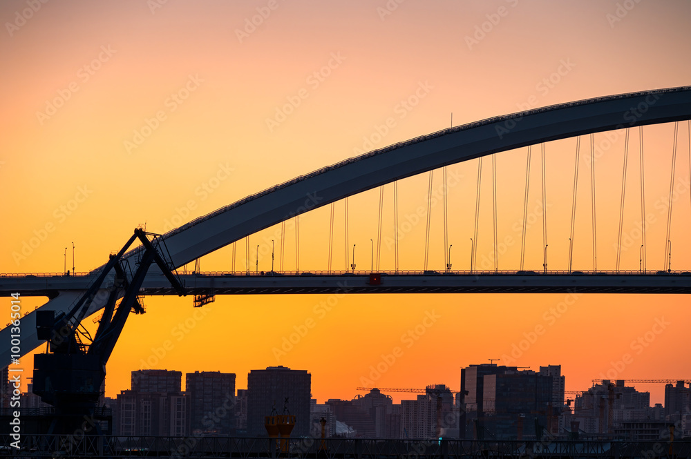Fototapeta premium Urban arch bridge at dusk, Lupu Bridge scenery in Shanghai, China