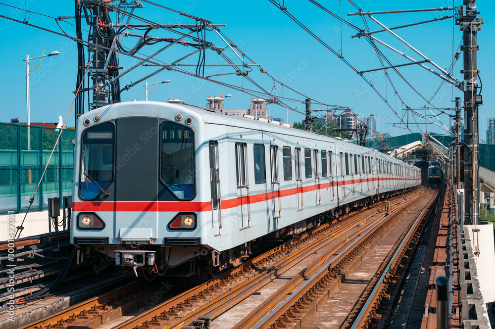 A subway train traveling on an elevated track in Shanghai, China. A subway train traveling on an elevated track in Shanghai, China.