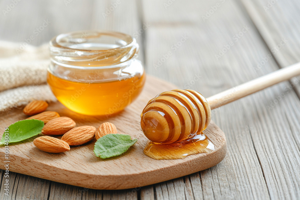 Almonds and honey on a wooden board, representing a natural and sweet snack
Almonds and honey on a wooden board, representing a natural and sweet snack