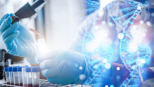 lab technician assistant analyzing a blood sample in test tube to research DNA at laboratory with microscope. Medical, pharmaceutical and scientific research and development concept.	