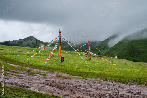 Prayer flags in the Qinghai Tibet Plateau region on rainy days photo