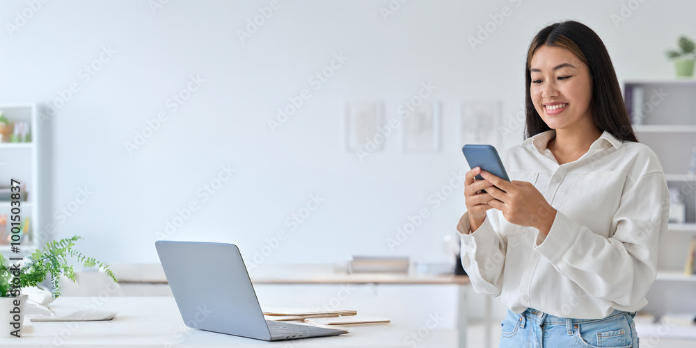 Banner of young asian woman using phone holding online video chat via mobile application. Businesswoman typing sms message, surfing social network. Internet technology and communication. Copy space Banner of young asian woman using phone holding online video chat via mobile application. Businesswoman typing sms message, surfing social network. Internet technology and communication. Copy space