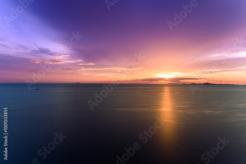 Dreamy sunset on tropical sea in Pattaya, Thailand. beautiful landscape of seascape with water reflection from sunlight. background for traveling and vacation.