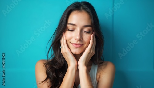 Relaxed Young Woman Smiling Against Bright Blue Background for Wellness and Self-Care Imagery