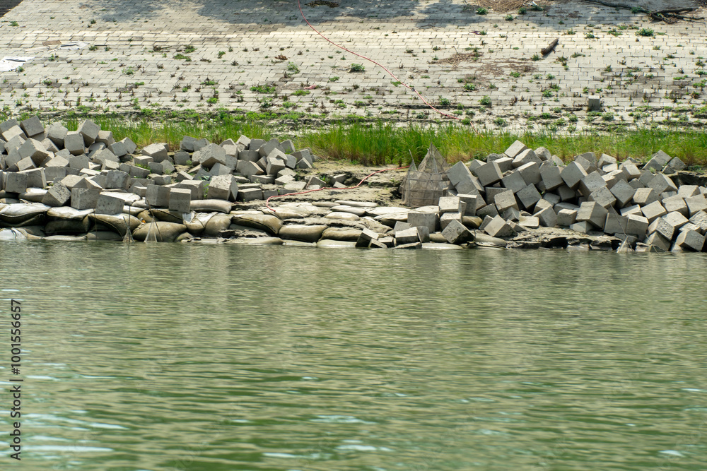 concrete cubes which serve as coastal protection from river erosion.