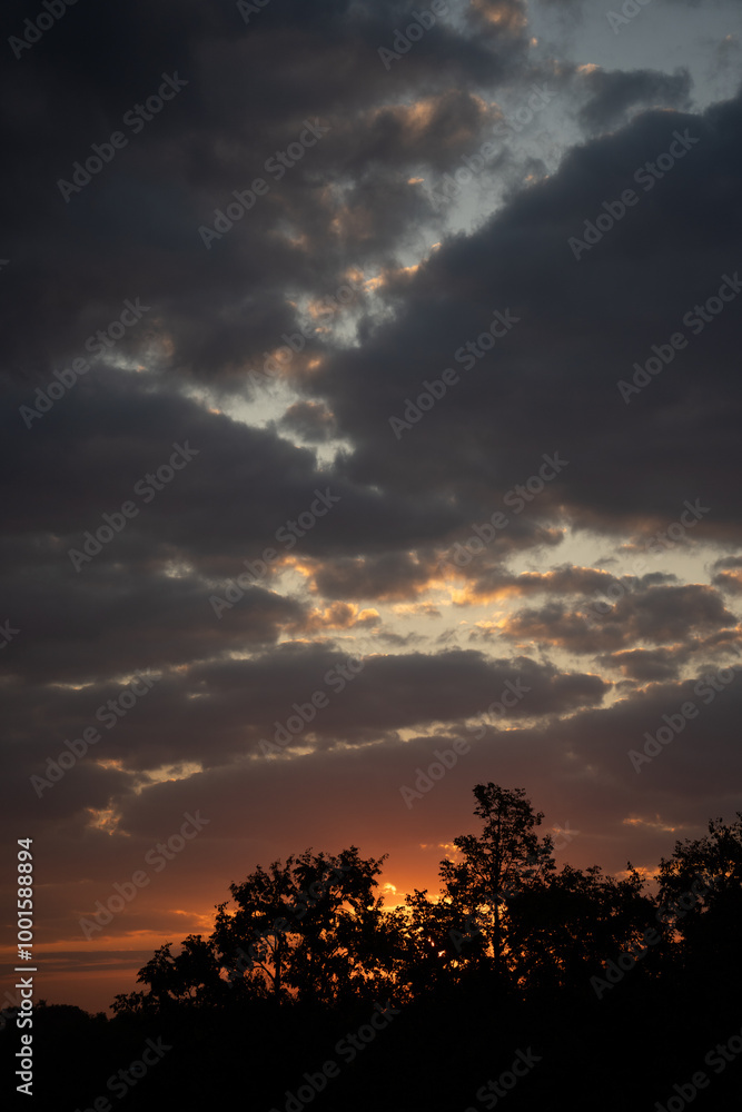 yellowish-blue evening sky against a backdrop of big clouds yellowish-blue evening sky against a backdrop of big clouds