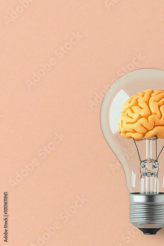 Unique light bulb design featuring a brain shape inside on a soft peach backg...