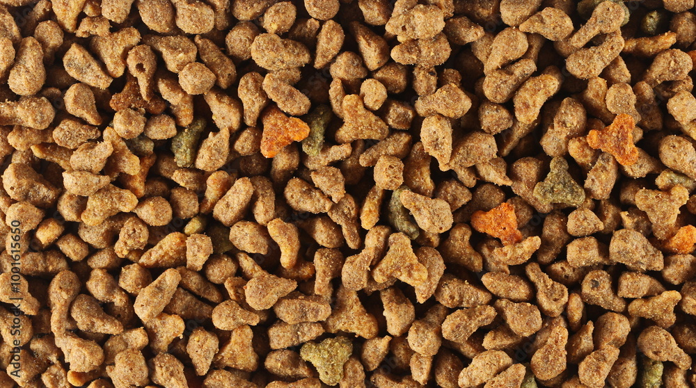 Pile dry colorful cat food background and texture, top view Pile dry colorful cat food background and texture, top view