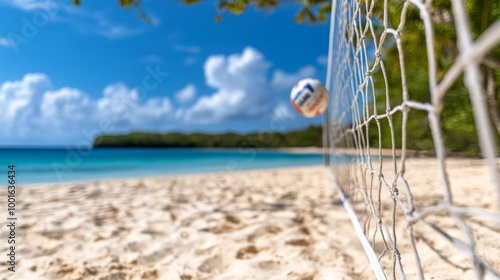 Beautiful beach with a volleyball net under a bright blue sky on a sunny day