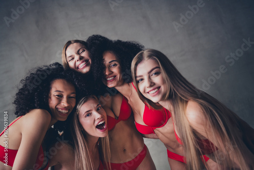 No filter photo of group charming girls embrace cuddle harmony self acceptance isolated on concrete wall studio background