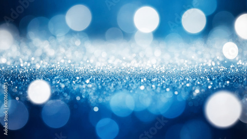 Blue bokeh lights and glittering background texture