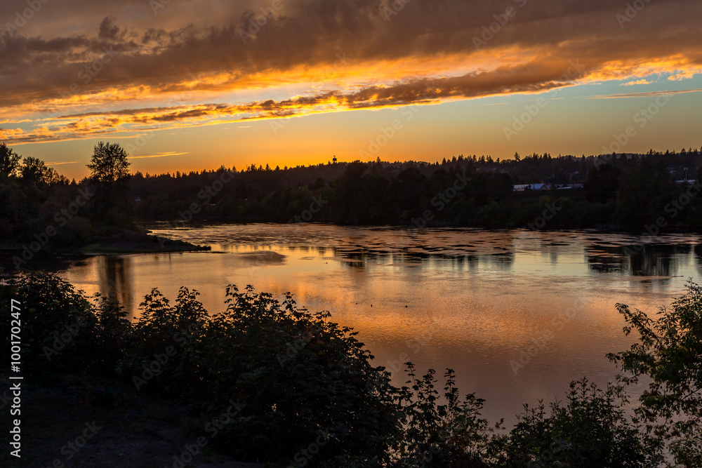 Willamette River sunset reflection in Salem, Oregon Willamette River sunset reflection in Salem, Oregon