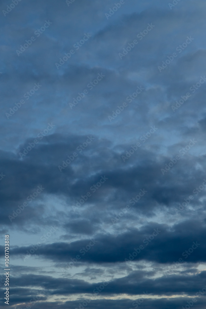 Obraz premium Unusual dark pink layered stratus clouds, skyscape.