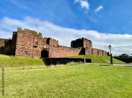 Obraz na płótnie Carlisle Castle, a historic fortress in England, stands proudly against a blue sky