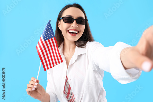 Young woman with USA flag t...