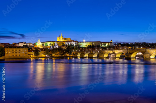 Prague, Czech Republic - July 16, 2024: Nighttime views of the Charles Bridge, Prague Castle and surrounding streets in Prague in the Czech Republic
 photo