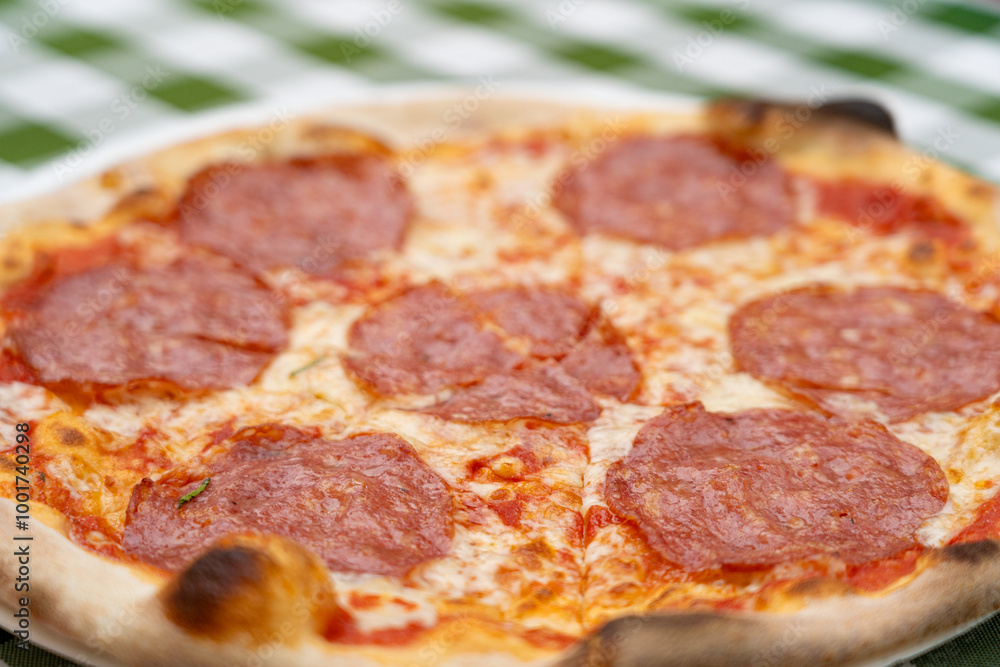 Pepperoni Pizza on Restaurant Plate, Macro Salami Pizza with Tomatoes and Mozzarella Cheese Texture, Selective Focus