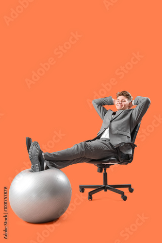 Young businessman in chair ...