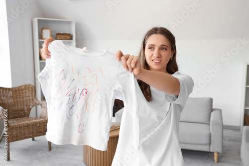 Young woman holding dirty b...