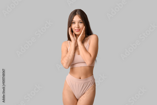 Beautiful young happy Asian...