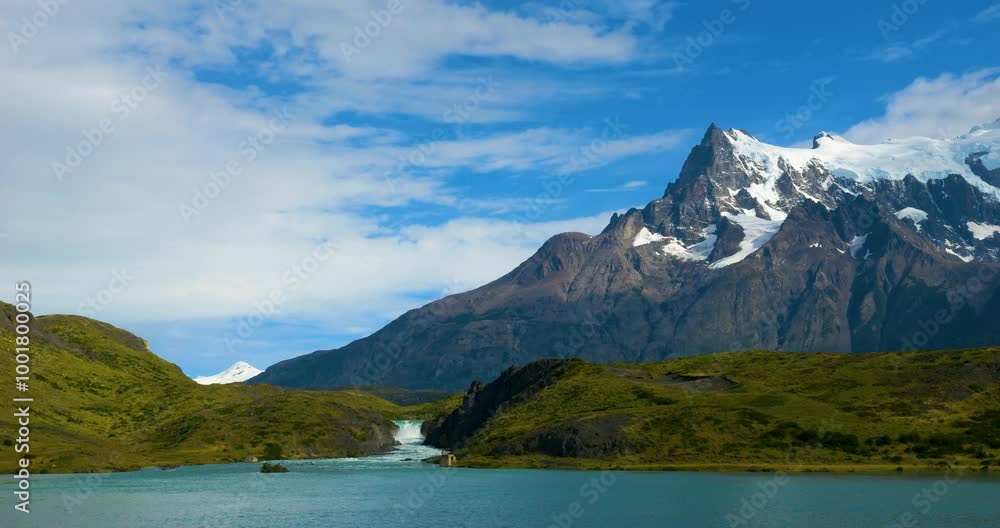 Lake and waterfall in front of a mountain range, Torres del Paine National Park, Patagonia, Chile, South America Lake and waterfall in front of a mountain range, Torres del Paine National Park, Patagonia, Chile, South America