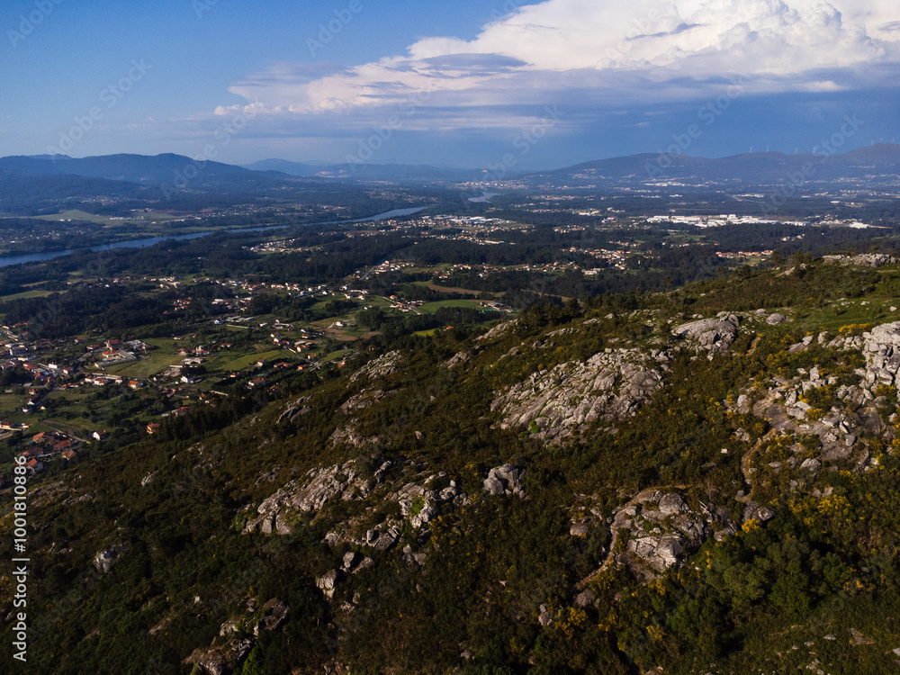 Obraz premium Aerial view of Vila Nova de Cerveira, Portugal. Miradouro do Cervo Viewpoint. Alto Minho, Viana do Castelo in Portugal. On one side of the river is Portugal, on the other is Spain