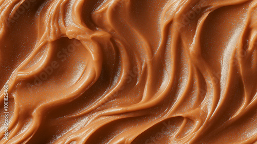 a close-up, top-down view, texture background of beechnut paste spread across the frame, filling the image with its soft brown hue and smooth, slightly coarse texture