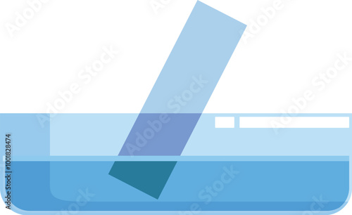 Litmus paper is being dipped in a beaker of blue liquid solution to test its ph level