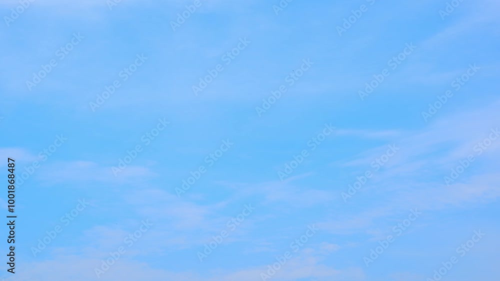 Timelapse : Experience the enchanting metamorphosis of cerulean clouds drifting and swirling in a celestial ballet, a symphony of azure hues. Time lapse. Sky background.
Timelapse : Experience the enchanting metamorphosis of cerulean clouds drifting and swirling in a celestial ballet, a symphony of azure hues. Time lapse. Sky background.