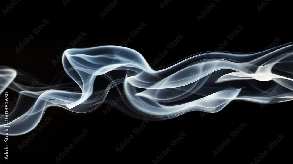 Obraz premium Waves of translucent smoke on black background