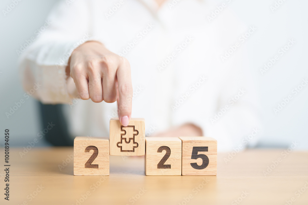 Naklejka premium 2025 block with jigsaw puzzle icon. Business Process, Team, teamwork, Goal, mission, Resolution, strategy, plan, Action, partnership, and New Year start