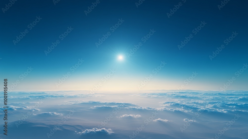 A panoramic landscape with a rich blue sky above sparse clouds, the sun a tiny bright point near the horizon A panoramic landscape with a rich blue sky above sparse clouds, the sun a tiny bright point near the horizon